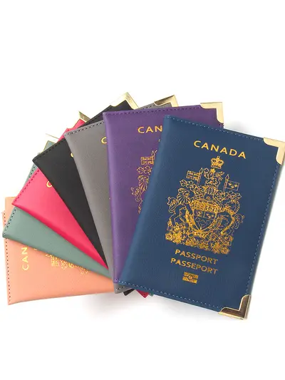 Leather passport wallet with copper feet and metal corners, lightweight slim
