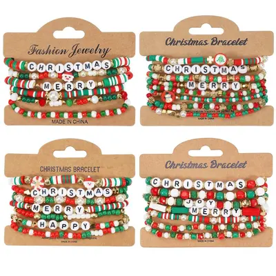Weihnachtsarmband mit Schneemann, Weihnachtsmann und Glöckchen aus Perlen