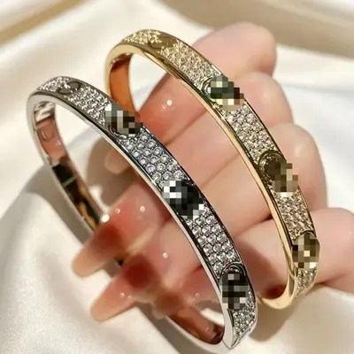 Wide round three-row crystal bracelet, metal snap clasp