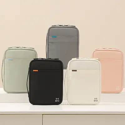 Passport holder, portable travel document organizer