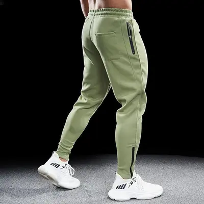 Erkek sonbahar kış spor koşu pantolonu, slim fit esnek, paça fermuarlı