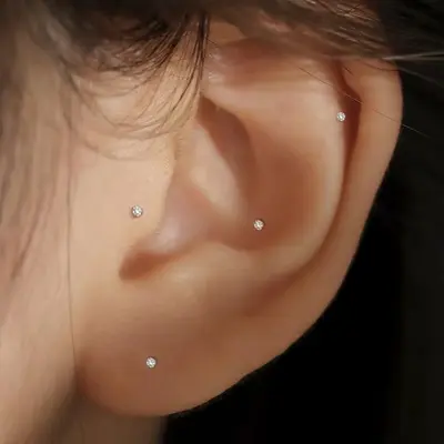 Pure Silver 999 Ear Studs with four-claw diamond setting