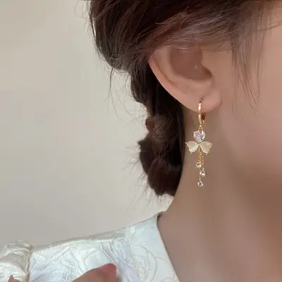 Lightweight luxury clover earrings with tassel detail