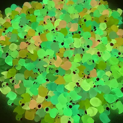 Glow-in-the-dark resin duck for DIY jewellery and mini decor