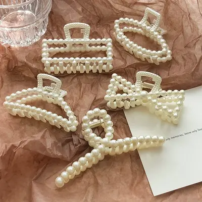 Popüler stil saç tokası taklit inci saç tokası köpekbalığı klip saç tokası kadın üst düzey büyük saç tokası içi boş plastik saç tokası
