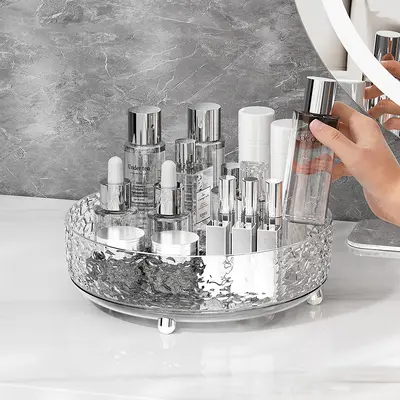 Rotating cosmetic storage box for makeup desk