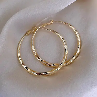 Large flat ring earrings - 10