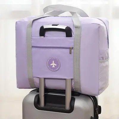 圆标飞机旅行收纳包加厚大容量衣服手提收纳袋旅游行李箱整理袋厂 - 11