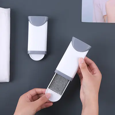 Fabric lint remover brush for sweaters and wool coats - 2