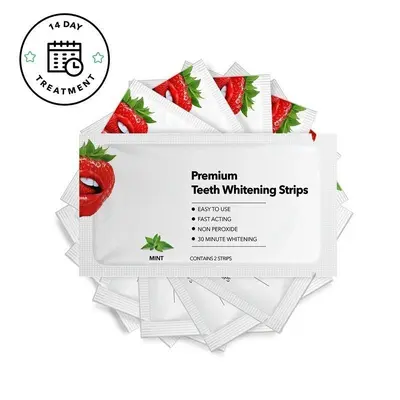Strawberry-flavored teeth whitening strips removing stains and yellowing