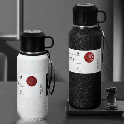 Double wall vacuum water cup, stainless steel with tea separation