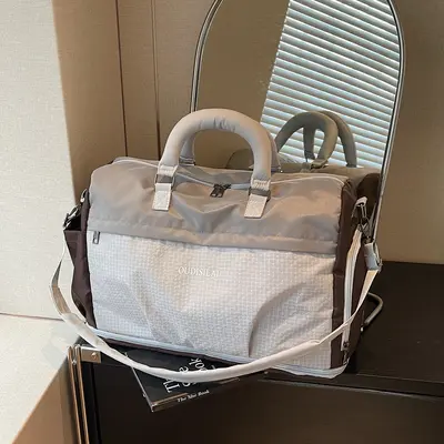 Expandable travel bag with shoe compartment, wet-dry separation