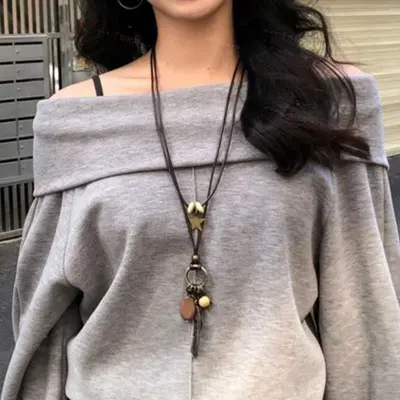 Round ring pendant necklace, black cord, long chain style