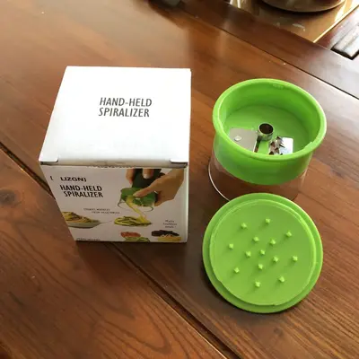 Spiral vegetable cutter, rotating carrot peeler