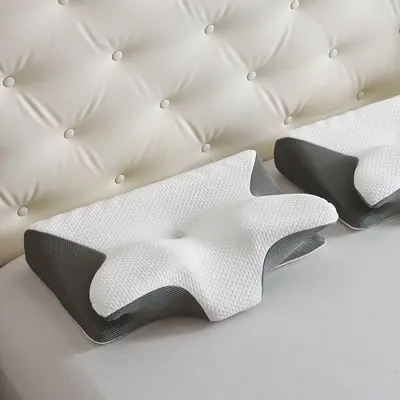 Sınır ötesi kelebek şeklinde hafızalı köpük yavaş ribaund hafızalı yastık çökmez boyun yastığı boynuz yastık servikal omurga yastığı toptan yastık çekirdeği