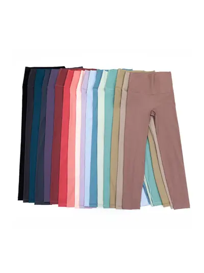 Yoga pantolonları fabrikası büyük beden yoga pantolonları toptan satış şeftali rengi kalça kaldırıcı çıplak hissi veren spor pantolonları dar kesim pantolonlar kadınlar için koşu fitness pantolonları