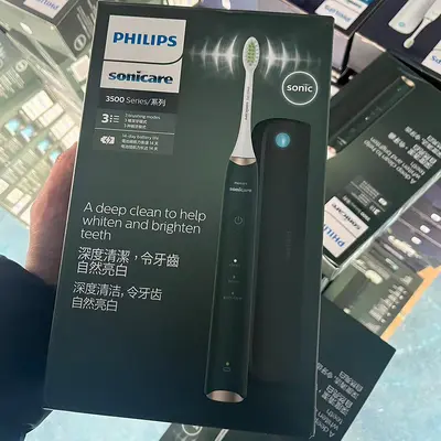 Philips HX2451 Electric Toothbrush, Rechargeable Sonic, Soft Bristles - 1