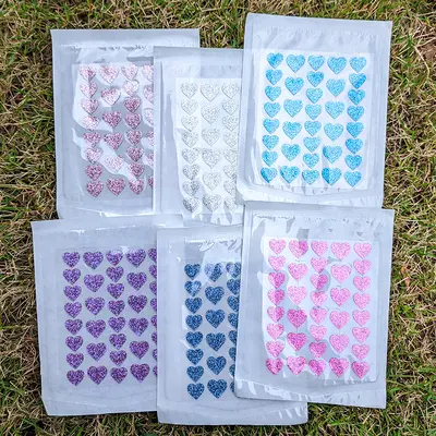 Herzförmige Akne-Patches 36er bunt mit Glitter Hydrokolloid