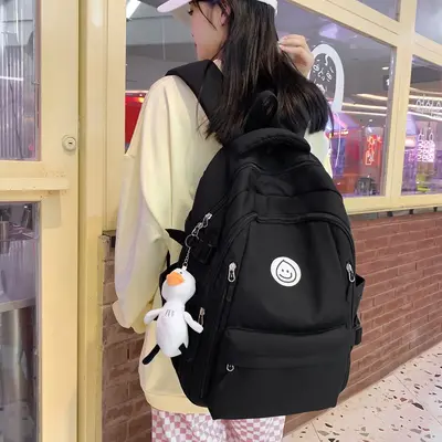 Grenzüberschreitender Rucksack koreanischer Stil Instagram-Stil vielseitiger Universitäts-Schülertasche Damen japanischer Stil Nylon-Mittelschüler-Rucksack großer Kapazität