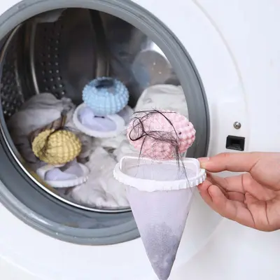 Laundry ball with filter mesh, hair catcher, anti-wrinkle