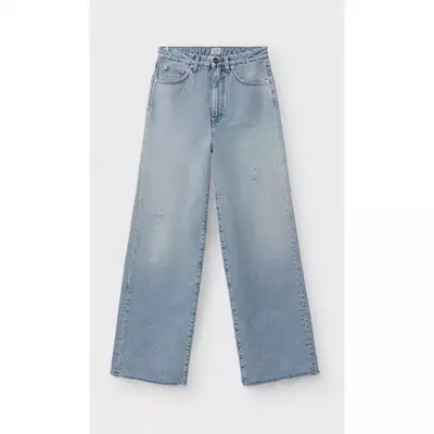 Kadın yıkamalı kot pantolon, düz kesim, yırtık detaylı, geniş paça