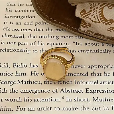 Gold egg-shaped gemstone stackable ring for women - 7