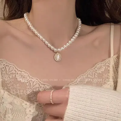 Kadınlar için hafif lüks niş üst düzey inci kolye, moda moda çok yönlü zarif titanyum çelik köprücük kemiği zinciri popüler kolye - 13