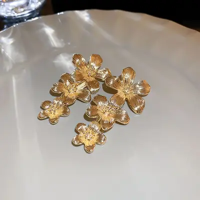 Silbernadel europäische und amerikanische grenzüberschreitende blumige geometrische quasten ohrringe moderner metallstil ohrringe leichte luxus high-end ohrringe großhandel