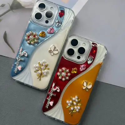 iPhone 17 Pro Max case with pearl necklace and butterfly details