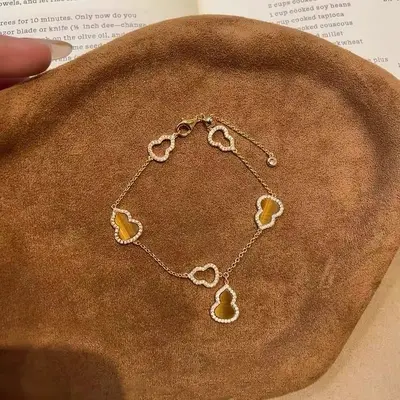 Parıltılı Çekiciliğe Sahip Trendy Taklit Fritillary Kabak Bileklik, Zarif ve Sofistike Stil, Chanel'dan Esinlenen Zarif Kadın Takıları. - 11