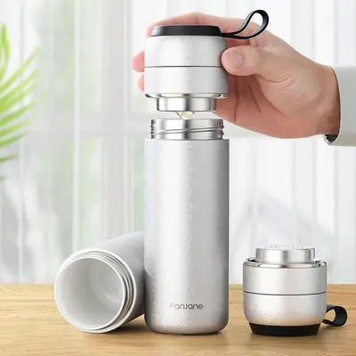 Çay-kahve ayrımlı seramik kaplamalı termos bardak, taşınabilir askılı, 350 ml