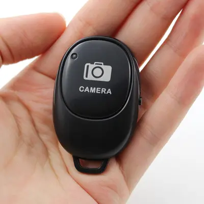 Sınır ötesi sıcak satış Bluetooth uzaktan kumanda çok fonksiyonlu şarj Android IOS cep telefonu selfie video deklanşör denetleyicisi