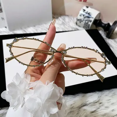 Ovale Sonnenbrille aus Metall mit Strasssteinen, modisch für Damen und Herren