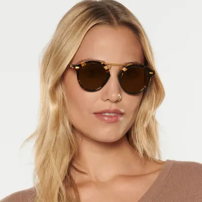Damen-Sonnenbrille mit runder Fassung und Leopardenmuster