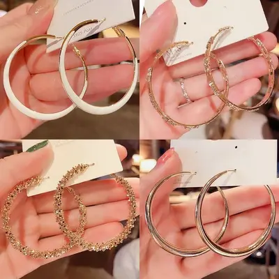 Gümüş iğne ışığı lüks üst düzey küpeler niş kişilik tasarımı kadınlar için abartılı küpeler moda mizaç küpeler toptan