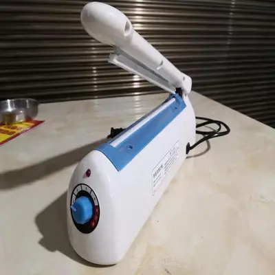 Hand pressure adhesive machine, plastic, film compatible - 7