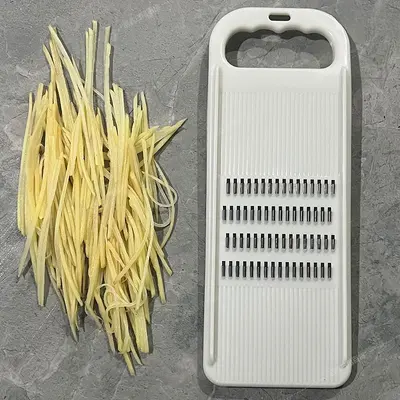 Vegetable shredder with hand guard, potato and cucumber slicer