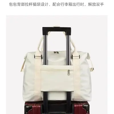 旅行包女大容量手提行李袋出游包衣物收纳大包男登机包短途待产包