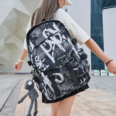 Trend Harajuku Style großer Rucksack mit Kapazität, Graffiti-Style cool und elegant für männliche und weibliche Schüler der Sekundarstufe und Mittelstufe.