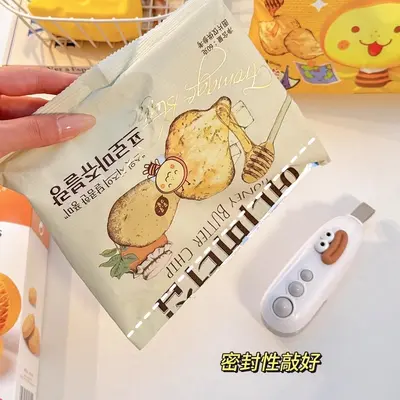 Mini hand-press plastic bag sealing machine