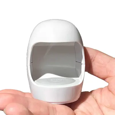 Yeni mini yumurta kabuğu manikür lambası UV fototerapi makinesi küçük taşınabilir çabuk kuruyan oje tutkal pişirme lambası kurutma lambası toptan