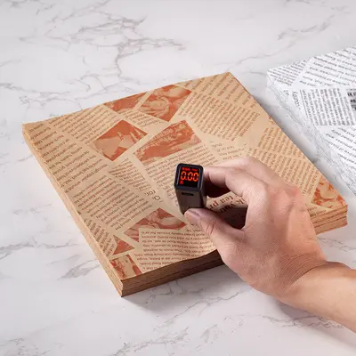 Sınır ötesi yağ geçirmez kağıt kızarmış tavuk kızartması burger kağıdı yağ geçirmez yağ emici kağıt pişirme yağı kağıdı sandviç ambalaj kağıdı gazete tarzı