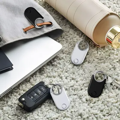Cross-border MFI anti-loss device keychain FindMy item tracker luggage locator global positioning