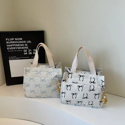 Moda bento çantası toptan yeni günlük hafif el çantası Kore versiyonu yüksek kaliteli seyahat ve iş çok yönlü el çantası