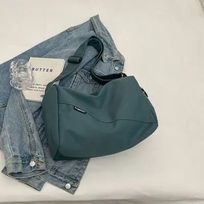 2025 summer new style simple and versatile university student solid color comfortable sports backpack shoulder bag men's lightweight crossbody bag women's - 12