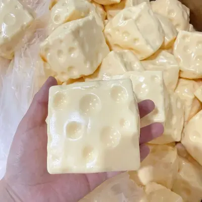Oversized Cheese-Shaped Squeeze Stress Toy Filled with Petroleum Jelly and Coconut Oil - 11