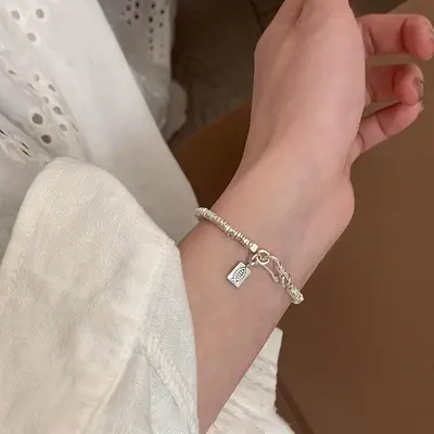 迈思卡通体足银999小鱼方牌手链女韩国高级小众设计复古盘缠手环