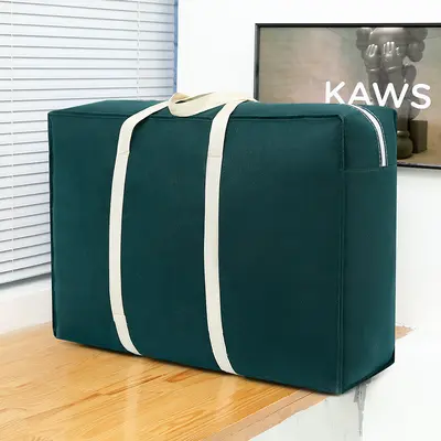 Portable non-woven durable moving bag, waterproof luggage bag, large capacity clothing and quilt storage bag wholesale