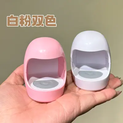 Yeni mini yumurta kabuğu manikür lambası UV fototerapi makinesi küçük taşınabilir çabuk kuruyan oje tutkal pişirme lambası kurutma lambası toptan
