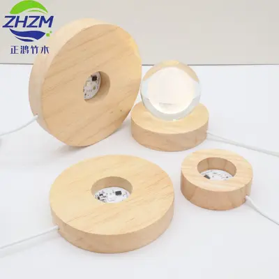 Üretici, stokta mevcut kauçuk ahşap LED lamba kristal tabanlı USB arayüzlü ahşap süs gece lambası yuvarlak lamba tutucu tedarik ediyor.